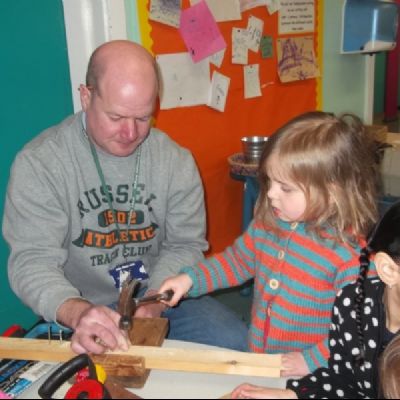 Darren Gregory (our caretaker) showing Nursery children how to cut safely (2)